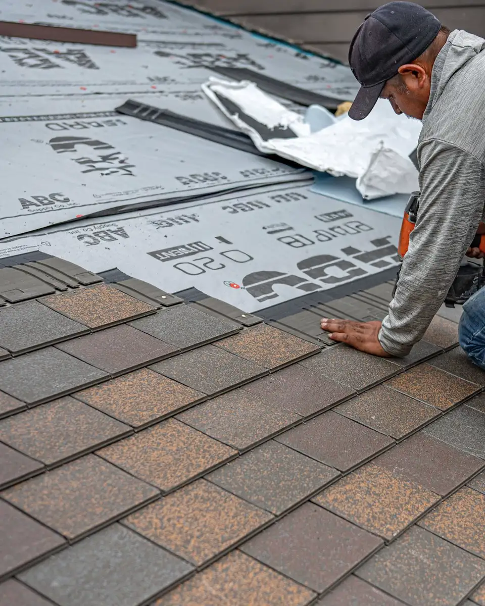 New architectural asphalt shingles being installed